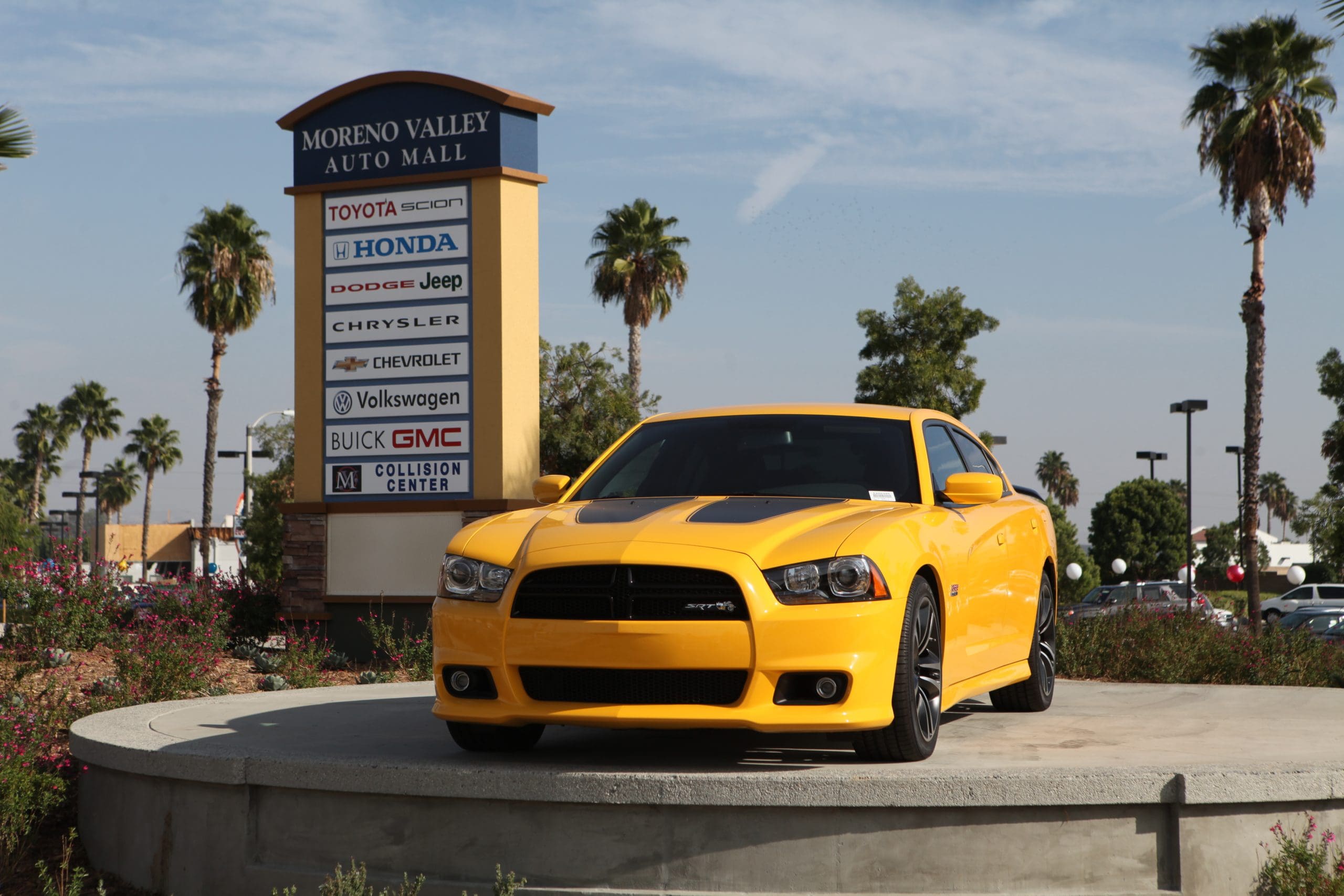 Moreno Auto Mall sign with Dodge Charger on pedistal